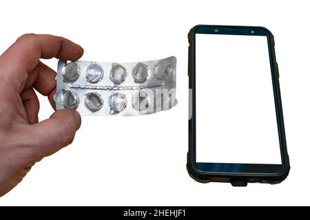 vide, utilisé emballage de médicaments sans comprimés, pilules dans une main de personne sur un fond blanc propre et isolé vide Banque D'Images