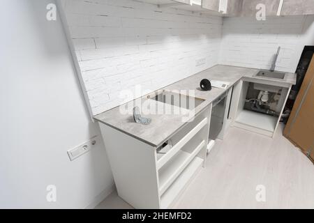 Cuisine sur mesure dans différents d'installation des armoires de cuisine remodeler Banque D'Images