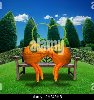 Couple embrassant sur un banc Banque D'Images