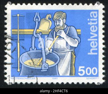 SUISSE - VERS 1993: Timbre imprimé par la Suisse, montre Cheesemaker, vers 1993 Banque D'Images