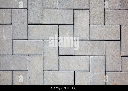 motif de chaussée composé de blocs de béton coulé de couleur grise Banque D'Images