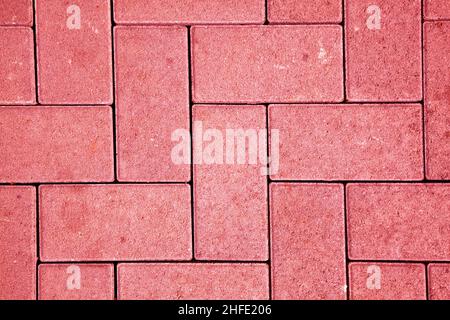 motif de chaussée composé de blocs de béton coulé de couleur rouge Banque D'Images