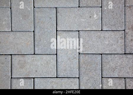 motif de chaussée composé de blocs de béton coulé de couleur grise Banque D'Images