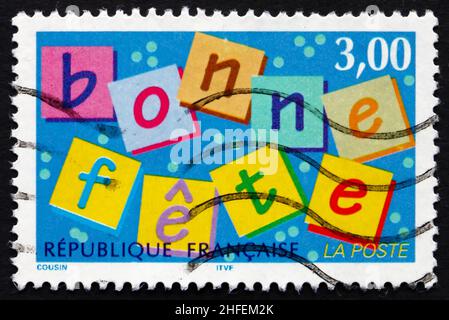 FRANCE - VERS 1997 : un timbre imprimé en France montre Happy Holiday, annonce, vers 1997 Banque D'Images