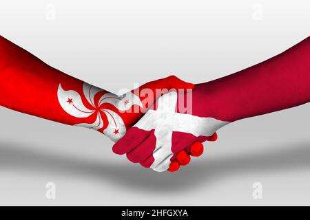 Poignée de main entre la croatie et les drapeaux de hong kong peints sur les mains, illustration avec chemin de coupure. Banque D'Images