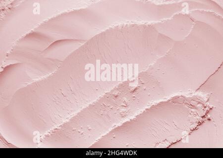 Arrière-plan cosmétique, texture argile.Masque rose argile sèche pour le visage et le corps Banque D'Images