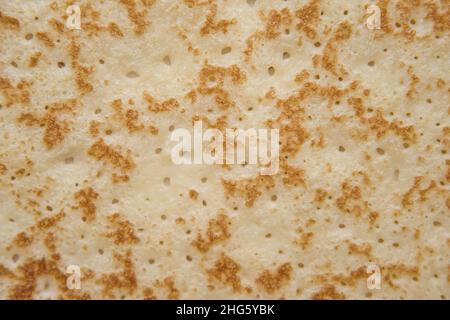 Fond de texture crêpe.Vue macro de répétition de surface crêpe.Dessert sucré russe traditionnel.Contexte alimentaire. Banque D'Images