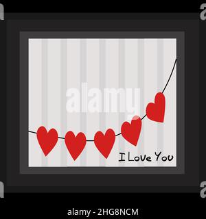 Coeur rouge suspendu sur une corde à linge pour la Saint-Valentin. Avec les mots je t'aime Banque D'Images