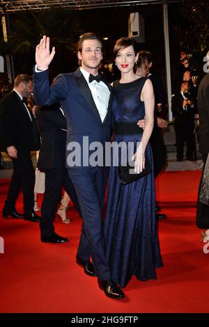 Photo du dossier datée du 17 mai 2014 de Gaspard Ulliel et de sa petite amie Gaelle Pietri au Festival de Cannes 67th.L'acteur Gaspard Ulliel est hospitalisé dans un état grave à l'hôpital universitaire de Grenoble, après une chute de skis qui s'est produite mardi à 4 heures dans la station savoyarde de la Rosière, il a été rapporté le mercredi 19 janvier.Le comédien de 37 ans a été retrouvé inconscient sur la station de ski avec un traumatisme crânien important.Il a été pris en charge pendant 1h15 sur place avant de pouvoir être évacué à l'hôpital, selon les informations de la France Bleu pays de Savoie.Photo de Nicol