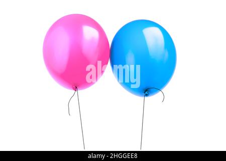 Des ballons roses et bleus gonflés à l’hélium flottent dans l’air. Concept d’une nouvelle naissance. Des ballons symbolisent une nouvelle femme, un homme ou des jumeaux. Banque D'Images