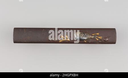 Knife Handle (Kozuka) 18th century Japanese A kozuka is a handle of a by-knife that is part of a sword mounting. It is kept in a slot on the reverse of a katana scabbard, often with a matching k?gai (hairdressing tool).. Knife Handle (Kozuka). Japanese. 18th century. Iron, copper-silver alloy (shibuichi), silver, gold, copper-gold alloy (shakud?). Sword Furniture-Kozuka Stock Photo