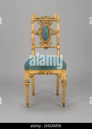 Chaise latérale ca.1870 Herter Brothers William H. Vanderbilt, fils de Cornelius “Commodore” Vanderbilt, a hérité d'une grande fortune et d'une entreprise de transport lucrative, qu'il a développée de façon exponentielle, devenant l'un des hommes les plus riches d'Amérique.En 1879, pour marquer son statut social et économique élevé, il a construit un manoir qui couvrait un bloc entier de la ville sur la Cinquième Avenue, entre cinquante-première et cinquante-deuxième rues.Il a chargé Herter Brothers, l'une des premières firmes d'ébénistes de New York, de décorer et de fournir sa maison.En concevant des schémas décoratifs distincts pour chaque chambre du Banque D'Images