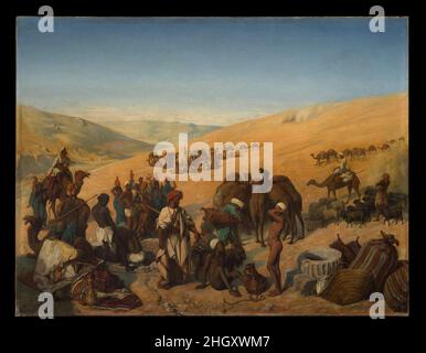 Arrêt des Caravans dans les puits de Saba (Beersheba) dans le désert au sud d'Hébron 1850 Charles de Coubertin les références aux puits d'Abraham, comme on les connaît couramment, se trouvent dans la Genèse (21:23–24 et 26:23–33).Coubertin peint typiquement des sujets religieux, mais dans cette photo il dépeint le site comme une scène de la vie contemporaine.Cette peinture a été exposée au salon de Paris de 1850 à 51.Arrêt des Caravans dans les puits de Saba (Beersheba) dans le désert au sud d'Hébron.Charles de Coubertin (français, 1822–1908).1850. Huile sur toile.Peintures Banque D'Images