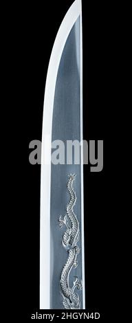 Lame et montage pour un Dagger (tant?)Blade, daté de 1870; montage, 19th Century Blade inscrit par Gassan Sadakazu Japonais en 1876, le gouvernement japonais a publié un édit abolissant le port de l'épée au Japon.Sadakazu est l'un des rares espadsmiths à continuer à travailler après cette date.Il a gardé l'artisanat vivant en faisant des répliques de lames anciennes.La lame de ce poignard est faite dans le style d'Umetada Myoju, un swordsmith actif à la fin du XVIe siècle ou au début du XVIIe siècle.L'inscription indique que Sadakazu a fait la gravure lui-même.Les raccords sont de Katsumori, un stude Banque D'Images