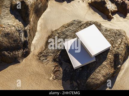 Modèle de livre vierge placé sur des rochers dans le sable, maquette de bloc-notes, maquette sur fond de nature 02 Banque D'Images