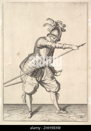 Un soldat glissant sa main droite le long de l'entraînement-brochet, de la série Lansquenets, planche 22, à Wapenhandelinghe van Roers Musquetten Ende Spiessen (l'exercice des armes) après Jacques de Gheyn II Netherlandish d'une série de 117 plaques numérotées du manuel de forage militaire, 'Wapenhandelinghe van Roers Museten' enquetten(L'exercice des armes).La série est divisée en trois ensembles : markmen (42 plaques), mousquetaires (43 plaques) et Lansquenets (32 plaques).L'exercice des armes a été publié pour la première fois en 1608, et plusieurs autres éditions ont suivi peu après, WIT Banque D'Images