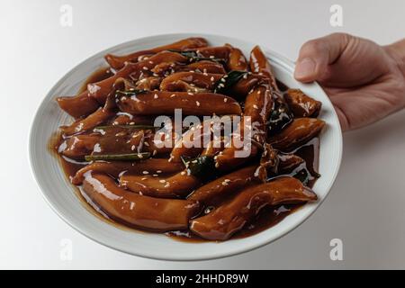 Jjajang Tteokbokki sur fond blanc Banque D'Images