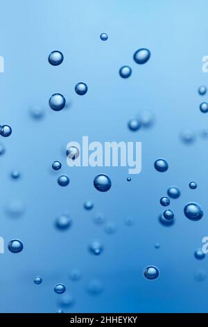 Arrière-plan bleu abstrait avec bulles avec effet de profondeur Banque D'Images