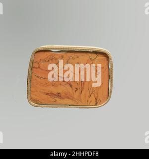 Fragment d'incrustation en mosaïque de verre fin du 1st siècle C.-B.–début du 1st siècle A.D. orange opaque romain avec des stries de rouge opaque.rectangle plat, avec coins arrondis.motif en mosaïque marbré dans un sol orange avec des tourbillons rouges.une grande puce sur un bord; partie supérieure polie; piqûres de bulles de surface sur le dessus;effet de morcellement et d'altération crémeuse sur le dessous et les bords.Fragment d'incrustation en mosaïque de verre.Roman. Fin du 1st siècle C.-B.–début du 1st siècle A.D..Verre ; moulé.Début de l'Impériale.Verre Banque D'Images