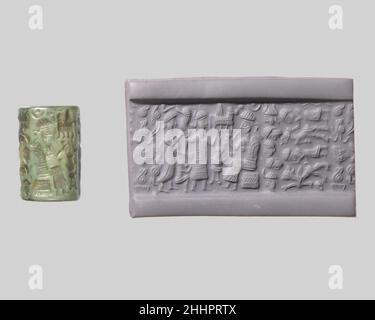 Joint cylindrique et impression moderne: Déesse menant un adorateur à une divinité assise; Dieu taureau ca.20th–19th siècle B.C. Old Assyrian Trading Colony bien que des pierres gravées aient été utilisées dès le septième millénaire avant J.-C. pour estampiller les impressions dans l'argile, l'invention, au quatrième millénaire avant J.-C., de cylindres sculptés qui pourraient être roulés sur l'argile a permis le développement de conceptions de joints plus complexes.Ces joints de cylindre, utilisés pour la première fois en Mésopotamie, ont servi de marque de propriété ou d'identification.Les phoques ont été soit impressionnés par les morceaux d'argile qui ont été utilisés pour fermer les bocaux, les portes, et les paniers, o Banque D'Images