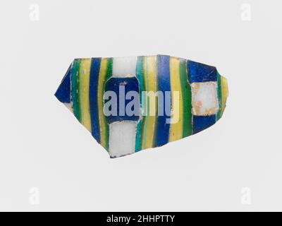 Fragment de mosaïque à rayures de verre fin du 1st siècle C.-B.–début du 1st siècle A.D. Roman.Fragment de mosaïque à rayures de verre.Roman. Fin du 1st siècle C.-B.–début du 1st siècle A.D..Verre ; moulé.Début de l'Impériale.Verre Banque D'Images