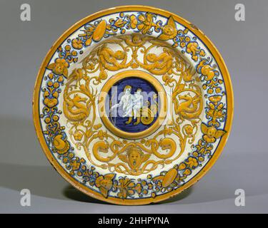 Plat pour une égout (bacile da versatore) ca.1520–30 Italien, Deruta.Plat pour une égout (bacile da versatore).Italien, Deruta. CA.1520–30.Maiolica (faïence émaillée).Céramique-Poterie Banque D'Images