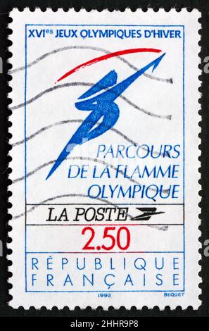 FRANCE - VERS 1991 : un timbre imprimé en France montre la flamme olympique, Jeux olympiques d'hiver de 1992, Albertville, vers 1991 Banque D'Images