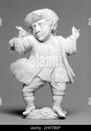 Dancing masculin Dwarf mi-18th siècle allemand ou néerlandais ces figures (voir aussi 1976.422.3a, b) sont sculptées à l'arrière et à l'avant, mais pas vraiment dans le rond.Le sculpteur a utilisé autant de la partie mince du tusk qu'il pouvait pour créer une image en trois dimensions ; les zones concave sombres sur le dos des figures montrent les restes de la cavité de pâte de tusk.Homme Dancing Dwarf.Allemand ou néerlandais. Mi-18th siècle.Ivoire: Base: ivoire et bois.Sculpture miniature Banque D'Images