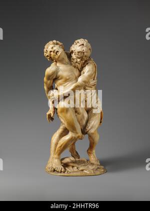 Hercules et Achelous probablement au milieu du 17th siècle attribué au Maître du martyre de Saint-Sébastien autrichien les exploits d'Hercules ont fourni aux sculpteurs l'occasion d'explorer la puissance de la figure masculine dans l'action complexe.Ce grand groupe, entièrement sculpté dans la ronde, montre la lutte entre le héros mythologique et l'un de ses ennemis, Antaeus ou Achelous, un dieu de rivière qui s'est transformé de l'homme au taureau au serpent.Cette œuvre et deux autres dans l'affaire sont attribués à un artiste anonyme qui a sculpté deux grandes scènes de relief représentant le début de l'agression chrétienne de saint Sébastien Banque D'Images