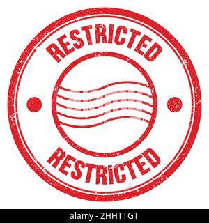 Le mot RESTREINT est inscrit sur le timbre-poste rond rouge Banque D'Images