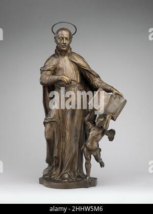 Saint Ignatius Loyola avec un Ange tenant un livre inscrit avec la devise de la Société de Jésus ca.1720–25 Francesco Bertos cofondateurs italiens de la Société de Jésus, Saints Ignatius Loyola (1491–1556) et Francis Xavier (1506–1552) ont été canonisés ensemble en 1622.Ces deux sculptures ont peut-être été faites pour marquer le centième anniversaire de leur canonisation.Saint Ignace se distingue par son visage en forme de cœur et la devise latine de la société, "AD MAIOREM DEI GLORIAM" (pour la plus grande gloire de Dieu), affichée sur les pages du livre tenu par l'ange à côté de lui.Saint-Franci Banque D'Images