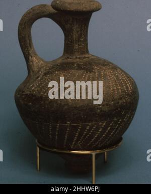 Dites el-Yahudiya-ware juglet ca.1640–1550 C.-B. deuxième période intermédiaire.Dites el-Yahudiya-ware juglet. Ca.1640–1550 C.-B. poterie; Tell el-Yahudiyeh ware.Deuxième période intermédiaire.De l'Egypte, région Memphite, Lisht Nord, cimetière, fouilles de MMA.Dynastie 15–17 Banque D'Images