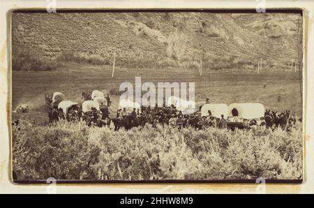 Mormon Emigrant train, Echo Canyon ca.1870 Charles William carter américain, né Grande-Bretagne né à Londres, Charles carter a appris la photographie comme soldat dans l'Armée britannique.En 1859, il s'installe à Salt Lake City, dans le territoire de l'Utah, et rejoint rapidement le studio de son compatriote et cofrère Mormon Charles Roscoe Savage.Peu de temps après, il a ouvert l'Emporium View de carter, qui a servi à la communauté mormon en pleine croissance de l'État théocratique de Deseret de Brigham Young.De 1850 à 1870, la population de Salt Lake City a augmenté en moyenne de 33 p. 100 chaque année; en 1870, nous y sommes Banque D'Images