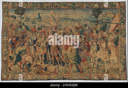 Agamemnon rassembla les troupes grecques à Aulis de l’histoire d’Iphigenia 1535–48 conception attribuée à Pieter Coecke van Aelst Un commandant martial, richement revêtu d’armure, se dresse au milieu d’un campement militaire animé, se préparant peut-être au départ, avec des boucliers, des lances, des coffres et d’autres objets riches empilés devant lui.Malgré la cohésion apparente de cette composition, le dessin a apparemment été assemblé à partir d'un groupe de motifs de figure existants, reconnaissable à d'autres succès narrative tapisserie conçue par des artistes dans le cercle de Bernard van Orley et par Pieter Coecke van Aelst. Banque D'Images