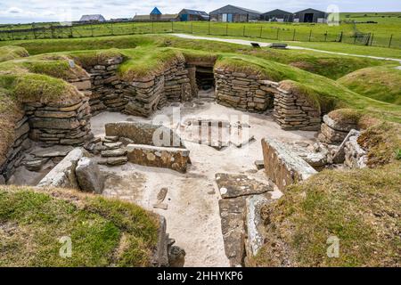 Village néolithique de Skara Brae à côté de la baie de Skaill près de Sandwick sur le continent Orkney en Écosse Banque D'Images