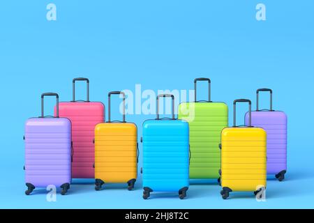 Valise ou bagage coloré sur fond bleu.Rendu 3D du concept de vacances d'été et des vacances Banque D'Images