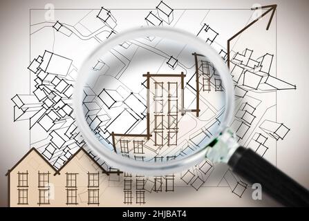 Étudier le marché immobilier - concept image avec une carte vue à travers une loupe. Banque D'Images