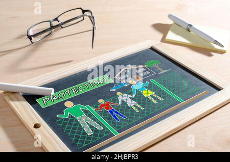 Concept de protection tiré sur un tableau noir Banque D'Images