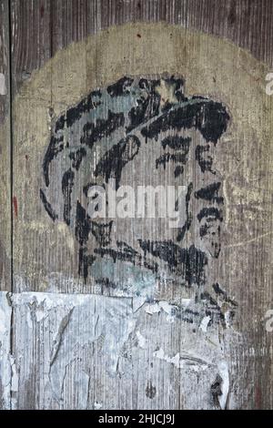 Un portrait du président Mao peint sur la porte de l'un des nombreux anciens villages du Guilin en Chine. Banque D'Images