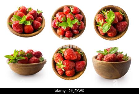 Fraises sur un bol en bois.Ensemble de fraises isolées sur découpe blanche.Collection de fraises entières sur fond blanc. Banque D'Images