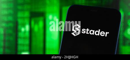 Kharkov, Ukraine - 27 janvier 2022: Logo de jeton Stader bannière d'arrière-plan de graphique de stock vert, concept de trading de crypto-monnaie Banque D'Images