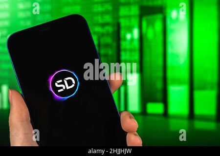 Kharkov, Ukraine - 27 janvier 2022: Logo de jeton de stader fond de graphique d'actions vert, concept de trading de crypto-monnaie Banque D'Images