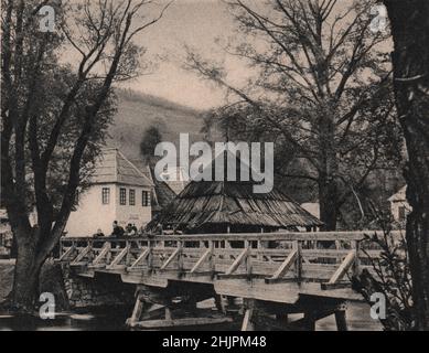 Situé au milieu des meres et des cascades, à huit kilomètres à l'ouest de Jajce, Jezero est célèbre pour son lac charmant qui regorge de truites et d'écrevisses. Bosnie-Herzégovine (1923) Banque D'Images