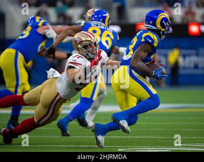 Los Angeles, CA, USA. 30th Jan, 2022. San Francisco 49ers defensive end  Nick Bosa (97) tries to tackles Los Angeles Rams running back Cam Akers  (23) In the first quarter during the