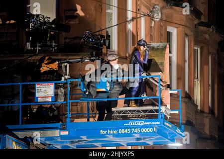 La combinaison Batgirl est repérée lors du tournage de « Batgirl » à Glasgow, car Glasgow est un stand pour Gotham City.Crédit: Euan Cherry Banque D'Images