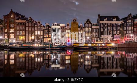 Europe, pays-Bas, Amsterdam.Scène du canal la nuit. Banque D'Images