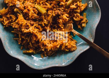 Lubia polo plat de riz persan avec boeuf haché, haricots verts, curcuma Banque D'Images