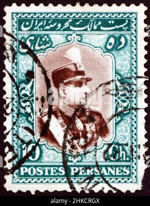 IRAN - VERS 1929 : un timbre imprimé en Iran montre Reza Shah Pahlavi, Shah de Perse, vers 1929 Banque D'Images