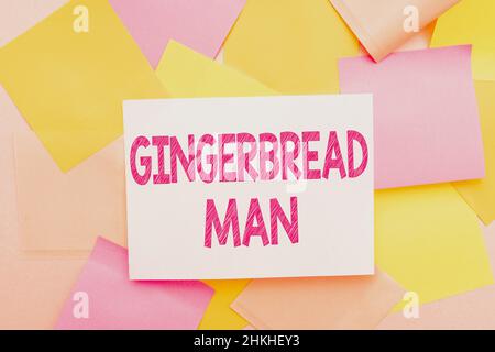 Enseigne manuscrite Gingerbread Man. Mot pour cookie fait de pain d'épice habituellement en forme de l'homme multiple de la collection articles de bureau assortis Banque D'Images