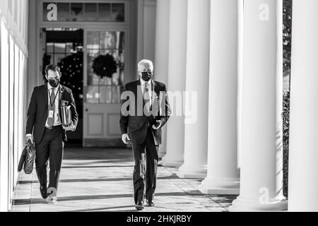 President Joe Biden walks along the West Colonnade, Monday, November 29, 2021, to the Oval Office. (Official White House Photo by Adam Schultz) Stock Photo